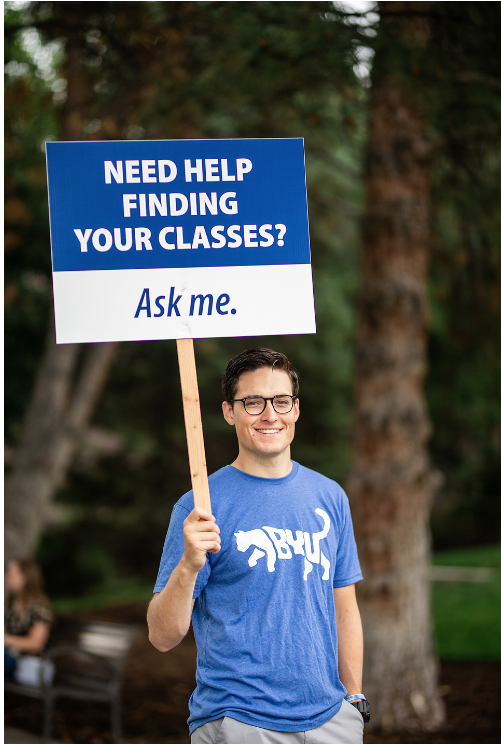 male holding sign