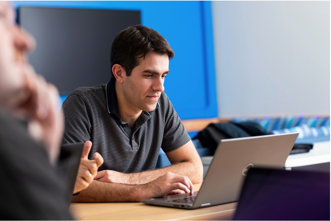 male using laptop